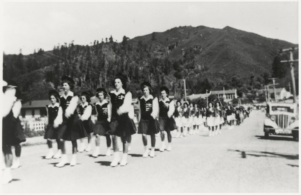 1949 Christmas parade: girls marching
