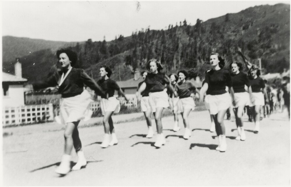 1949 Christmas parade: girls marching