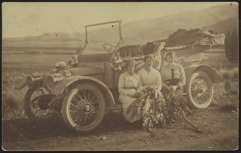 Group photograph with car