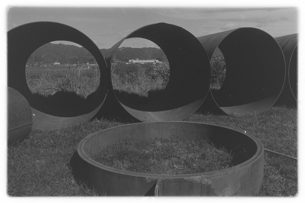 Buried tip site delays bridge