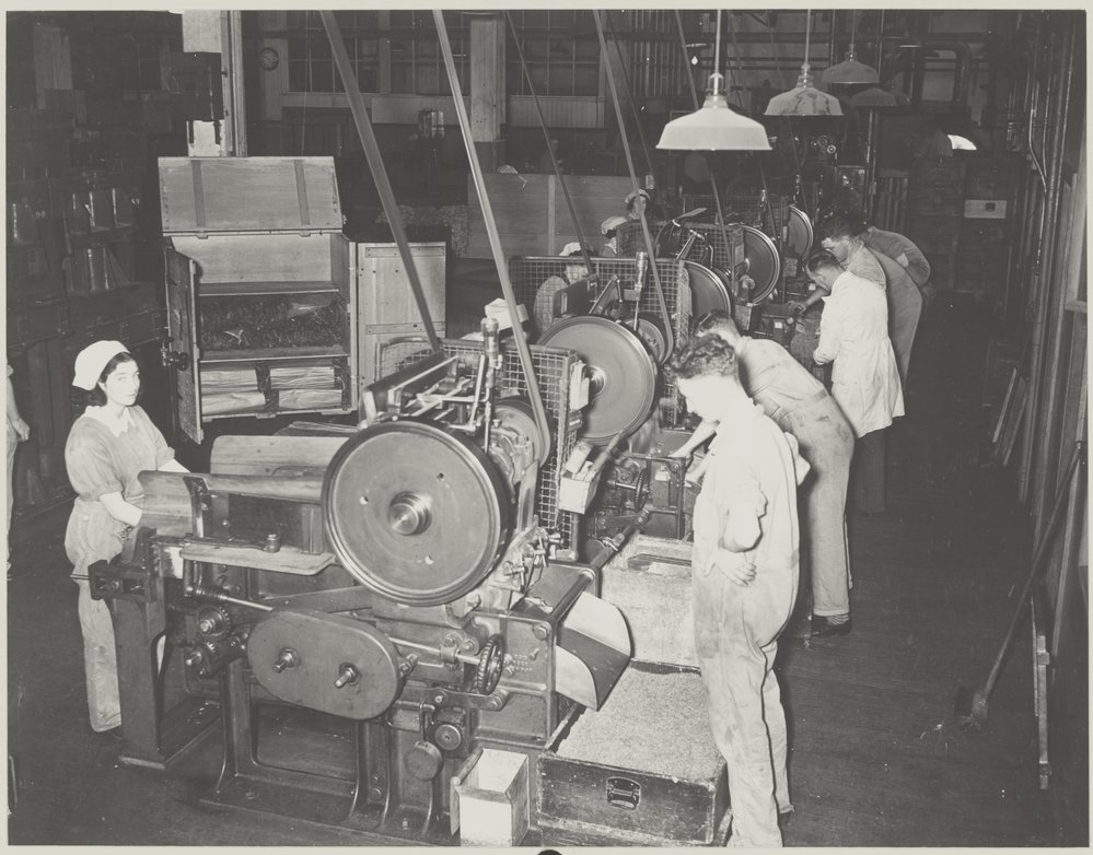 W.D and H.O. Wills staff working at stemming machines