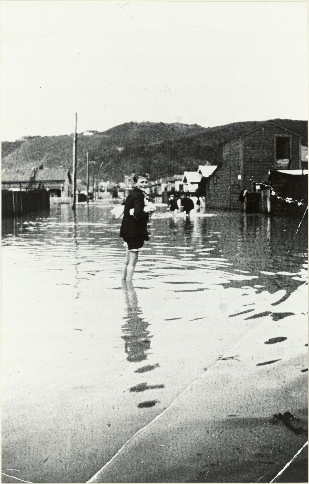 Boy standing in water in Petone