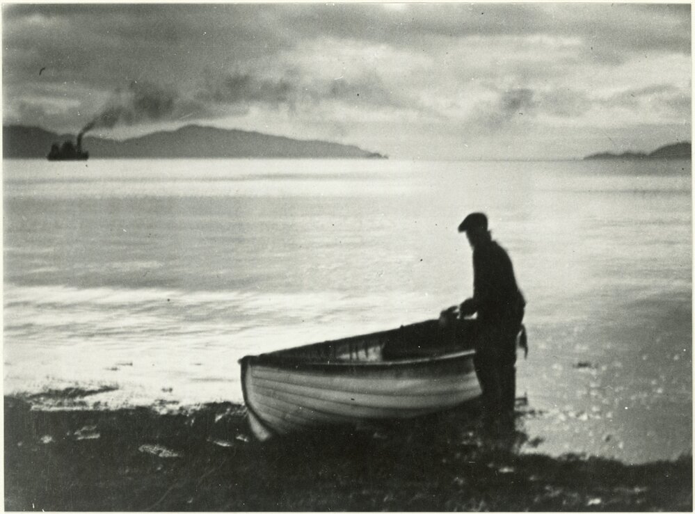 Man with dinghy