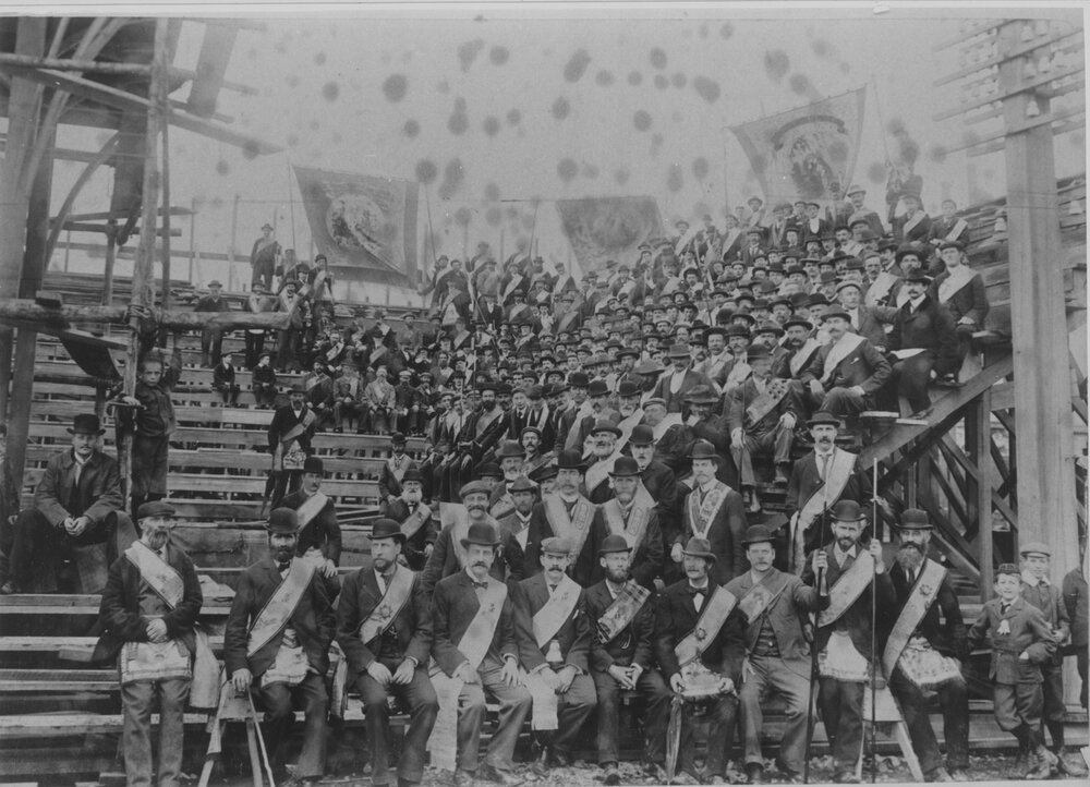 Orange Lodge: seated outdoor gathering