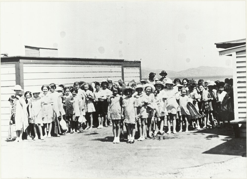 School children line up after swim