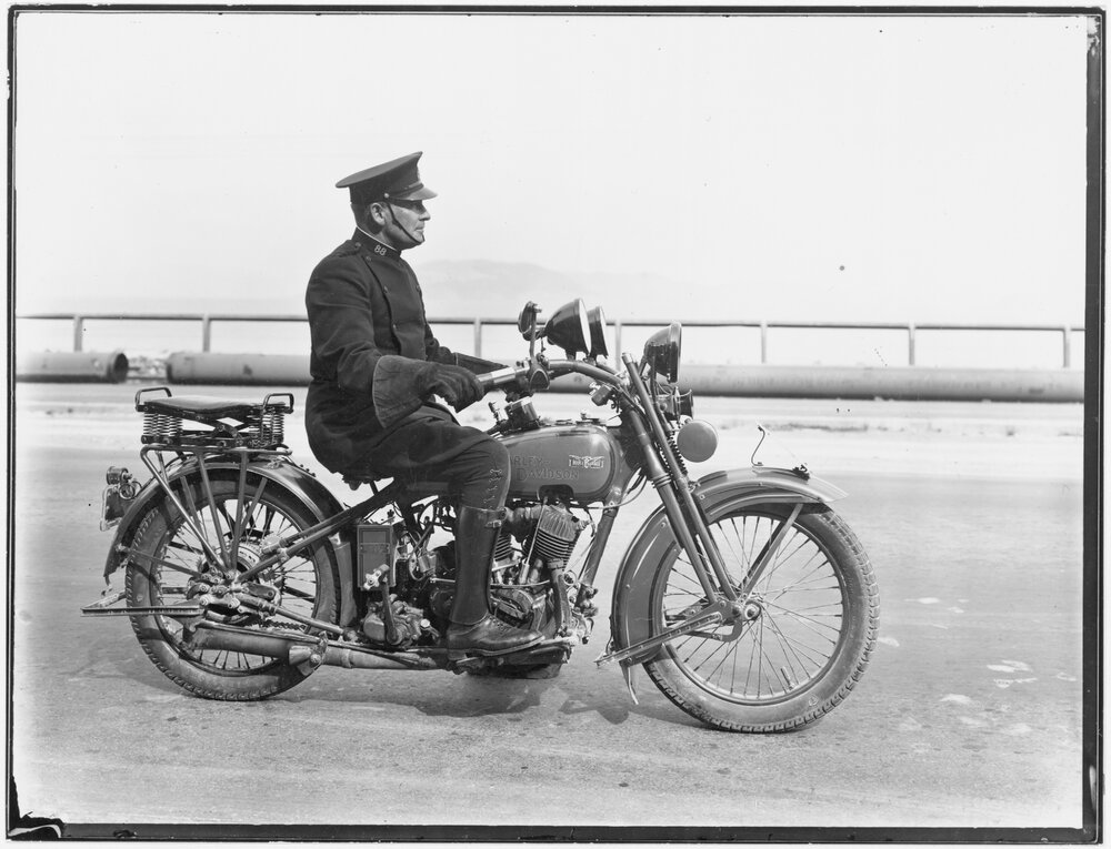 Harley-davidson with mounted policeman