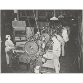 W.D and H.O. Wills staff working at stemming machines