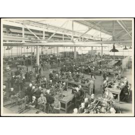 Photographs of women working on munitions at the Ford Factory